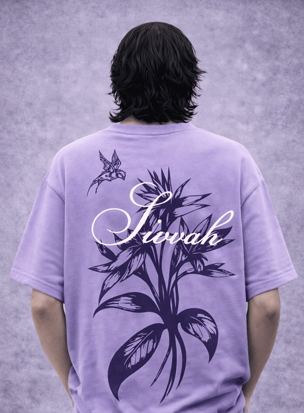 Person wearing a purple t-shirt with floral design and 'Sivah' text on the back against a gray background