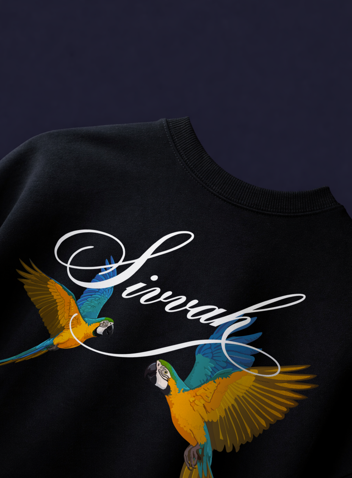 Black sweatshirt with colorful parrot design and 'Siamah' text on a dark background